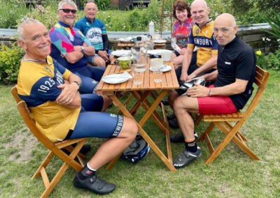 Cyclists eating at Krumbz Café